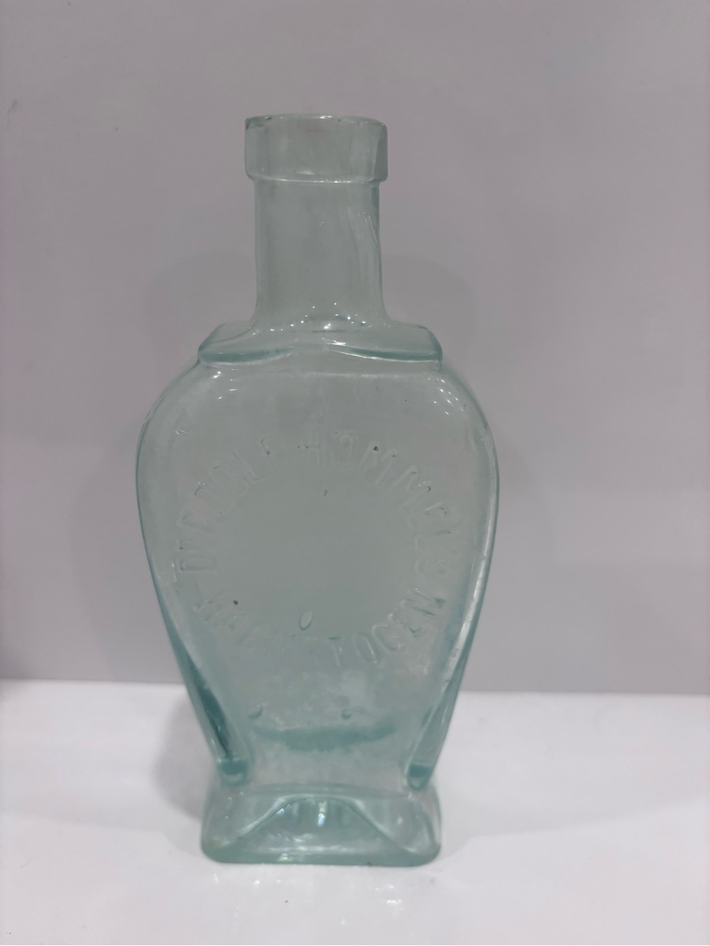 Vintage Dr.Howells healing lotion embossed aqua glass patent medicine bottl1900